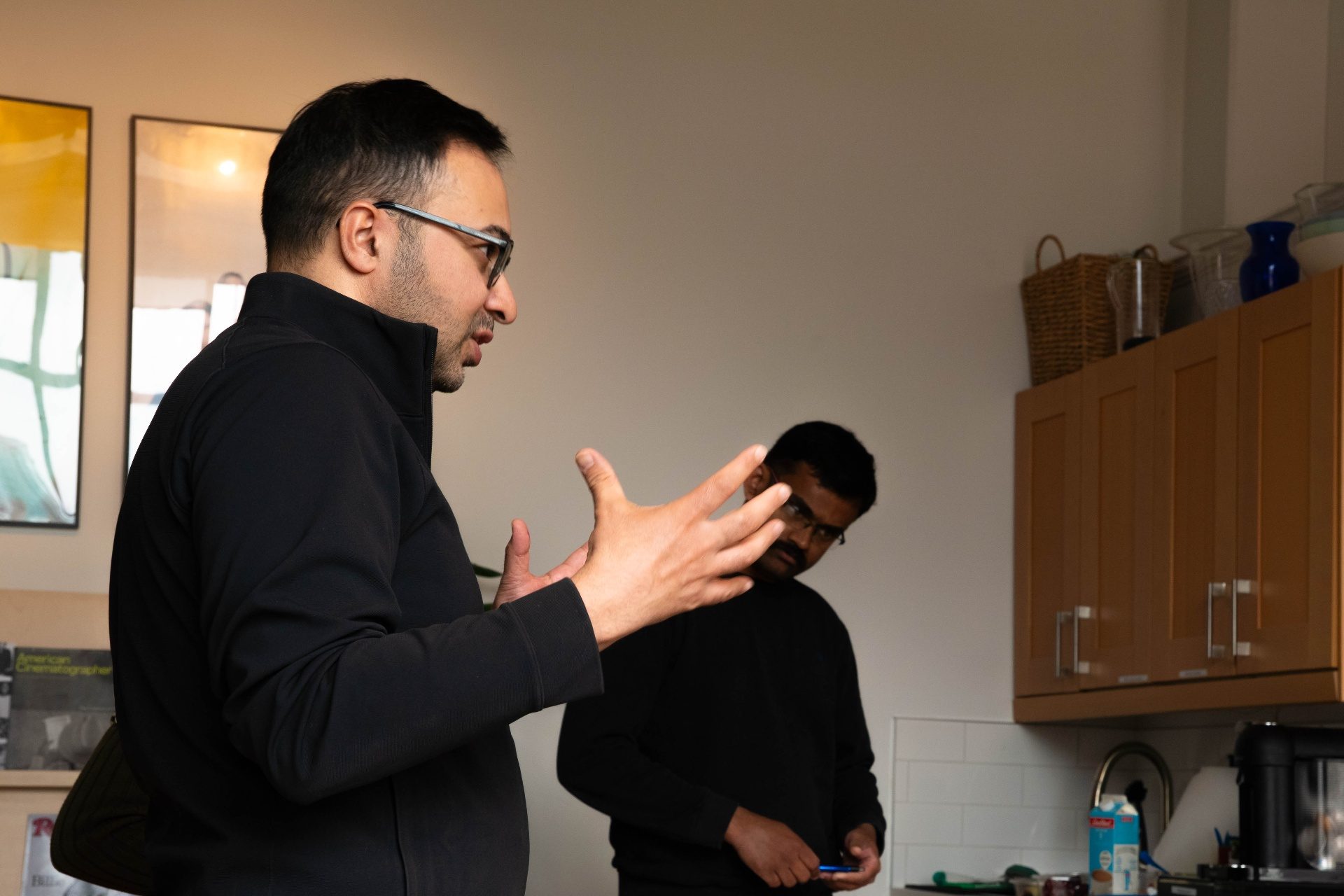 Animated discussion in the kitchen area